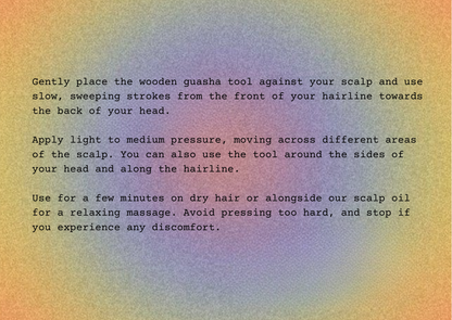 Instructional text on a textured, iridescent background with a yellow, orange, and blue gradient. The text describes how to use a wooden guasha tool for scalp massage.